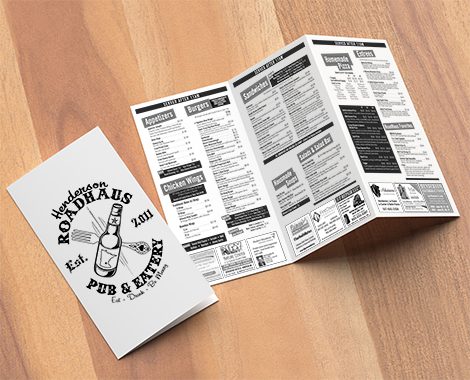 Thrifold - Three fold brochure mock up on wooden background. 3d illustrating